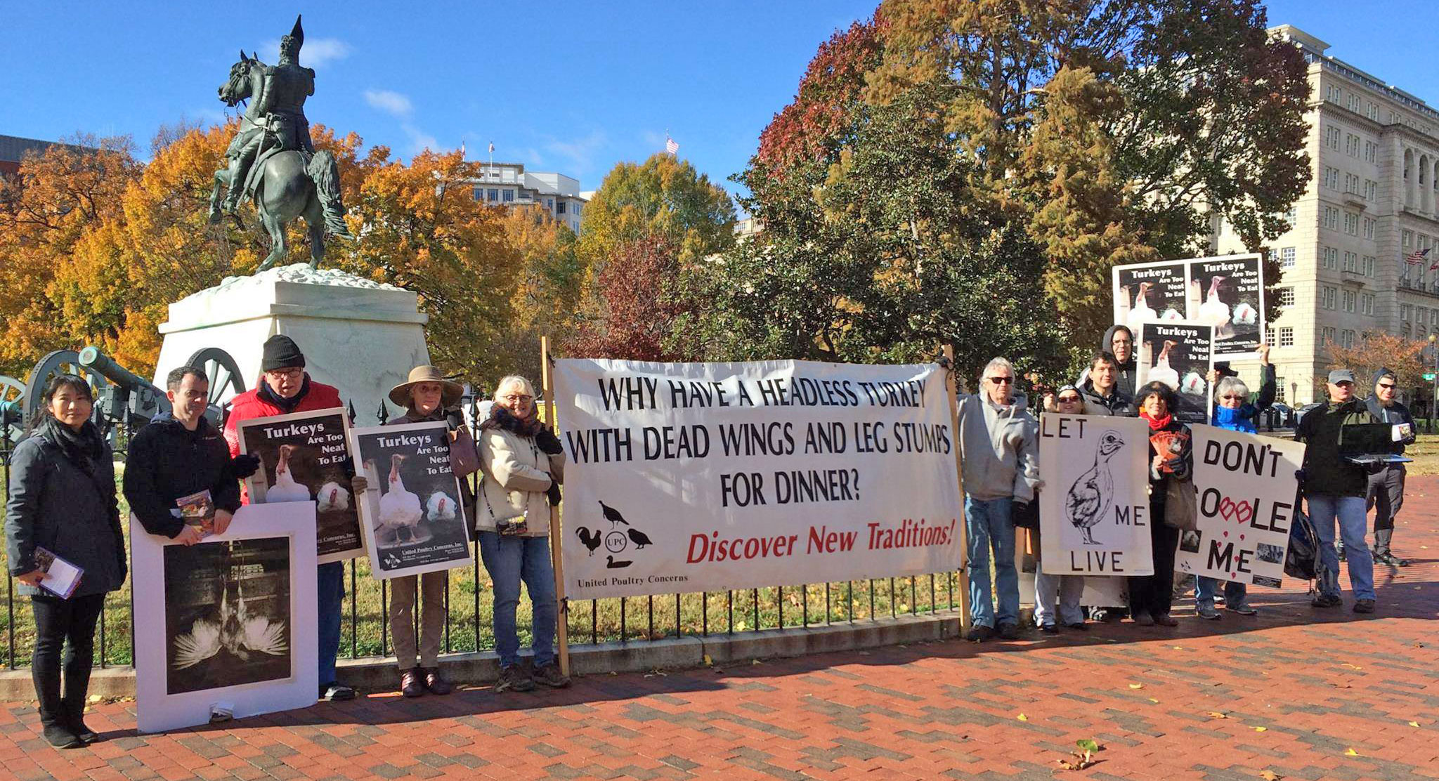 Activists with signs near the White House