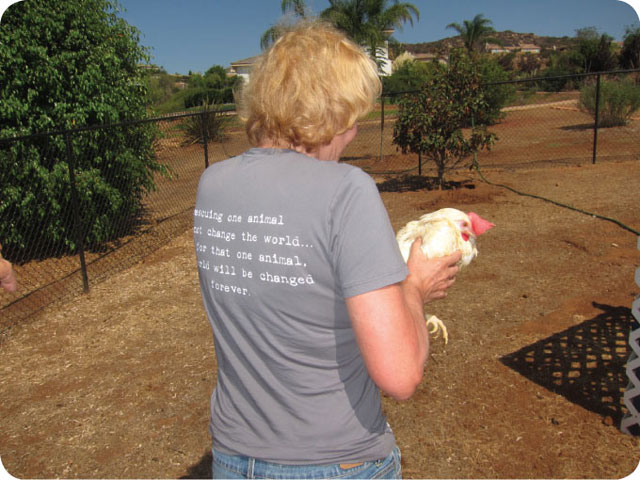 la activist carries hen to freedom