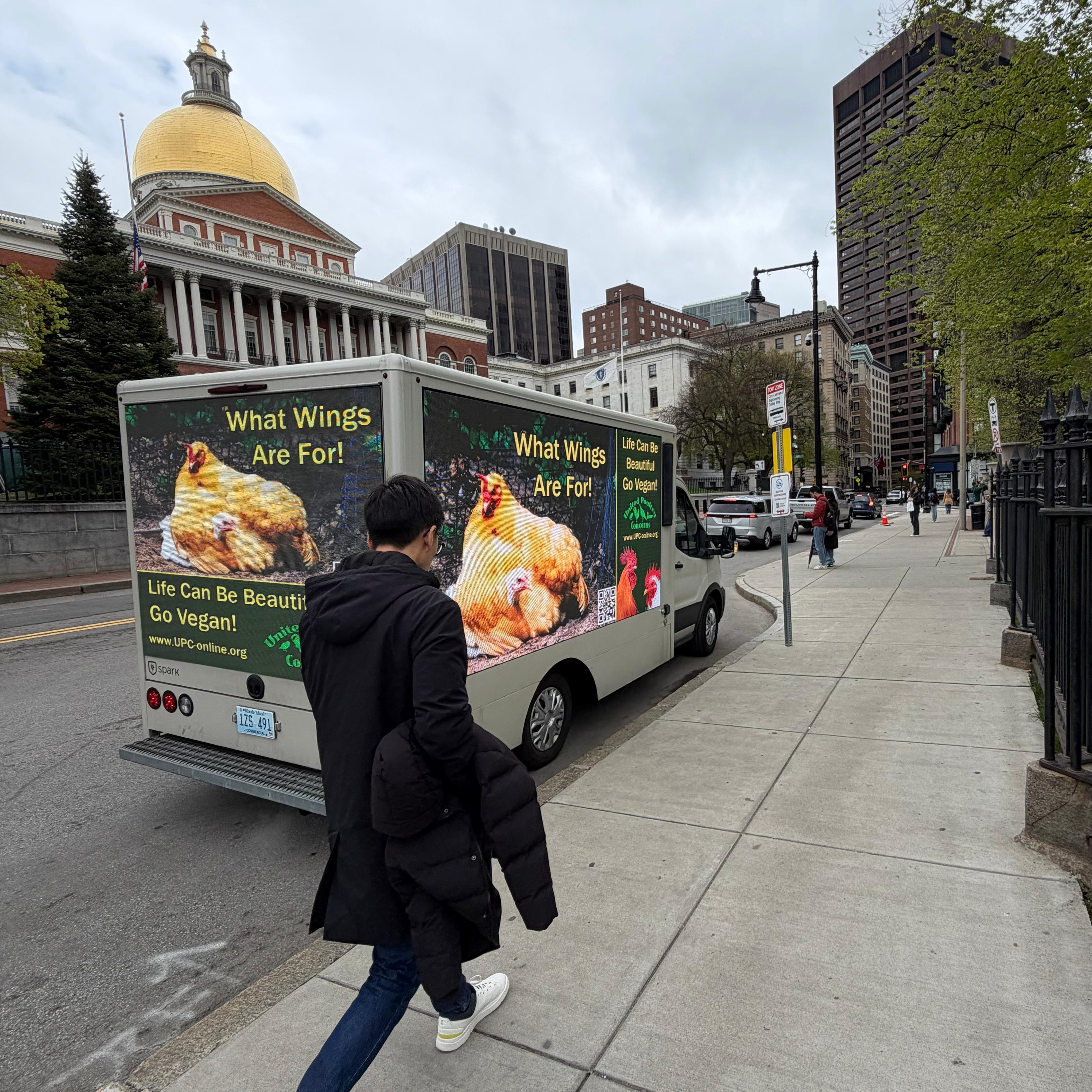 Truck iwth 'What wings are for' posters''