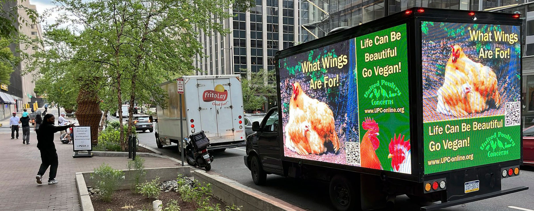 Protesters standing with signs at Lafayette Square, Washington, D.C.